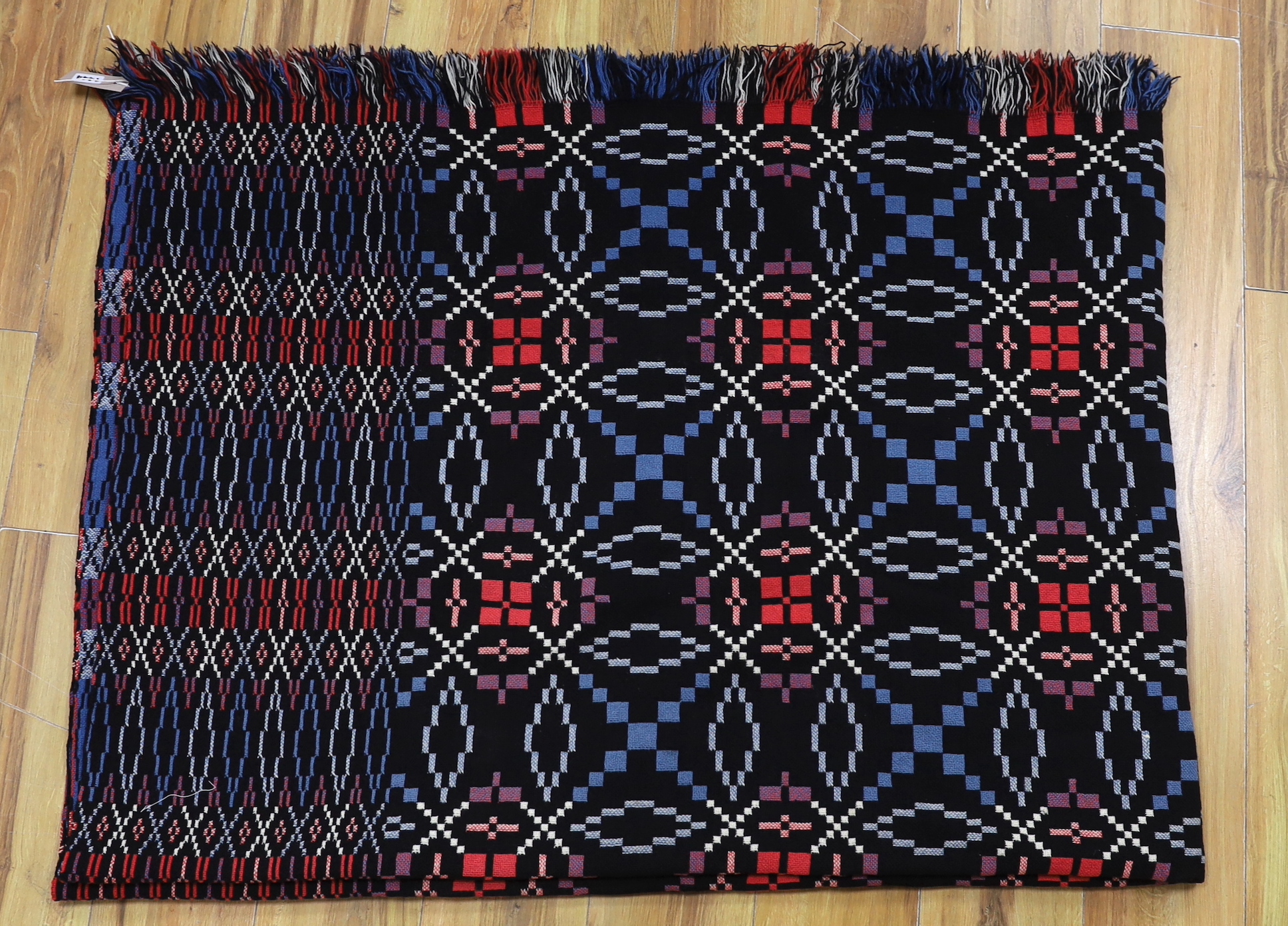 A Welsh blanket, 221 x 163cm.